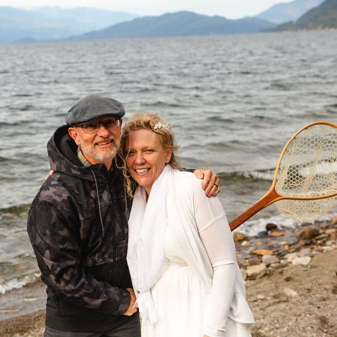 Mark and Connie from He Is Ministries, pictured together on a beach.